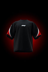 Black oversized F1 racing T-shirt with minimalist Formula 1-inspired graphic and red sleeve detailing